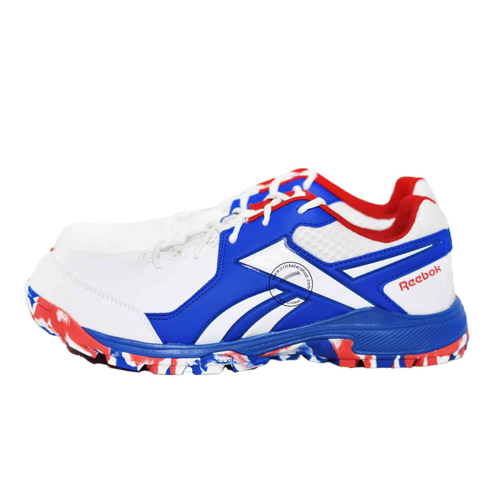 Reebok Brilliance Cricket Rubber Shoes White/ Vector Red/ Vector Blue