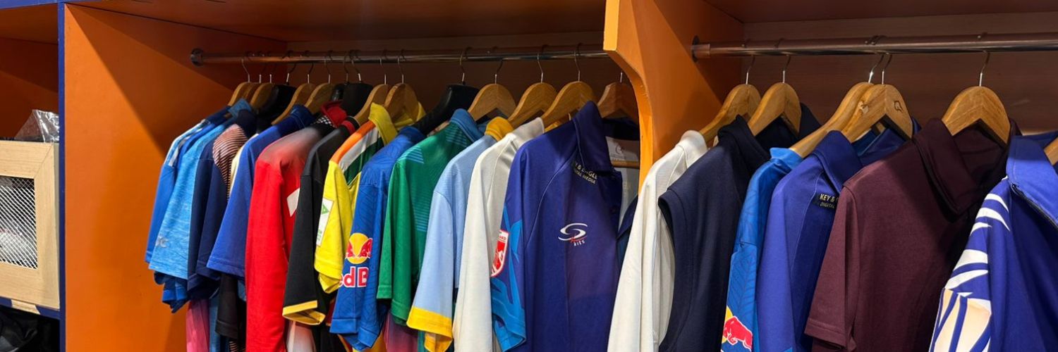 Cricket and football team jerseys displayed in multiple colours