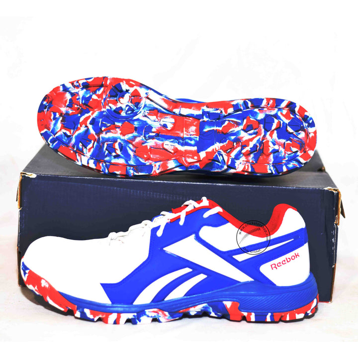 Reebok Brilliance Cricket Rubber Shoes White /Vector Red /Vector Blue Size @ Side View 2