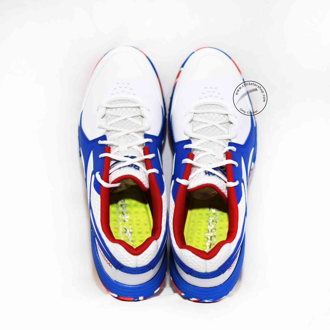 Reebok Brilliance Cricket Rubber Shoes White /Vector Red /Vector Blue Size @ Top View