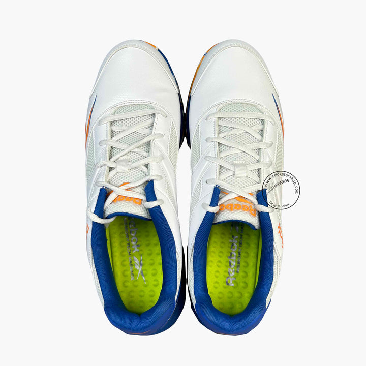 Reebok Re-Volve Tech Cricket Rubber Shoes White /Shocking Orange /Vector Blue Size @ Top View